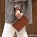Go-To Wristlet Clutch Brandy Leather Handbag - unlined Nisolo 