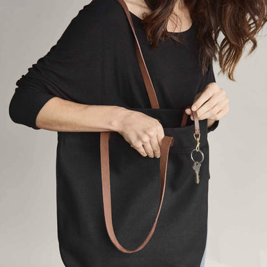 Image 1 of the Canvas Tote Black on model