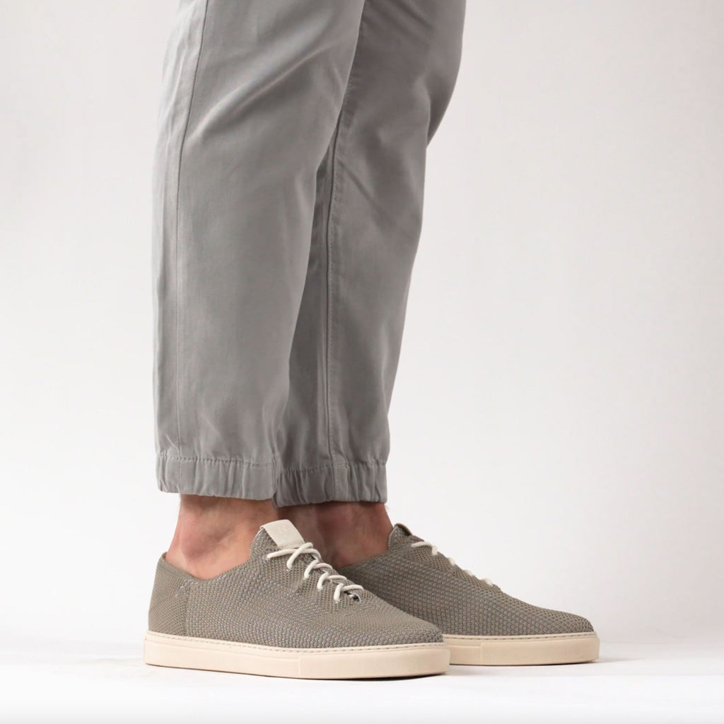 Video 1 of the Men's 365 Eco-Knit Sneaker Grey shown on a model in motion