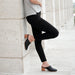Image 1 of the All-Day Heeled Mule Black on model 