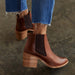 Image 1 of the Heeled Chelsea Boot Brandy on model