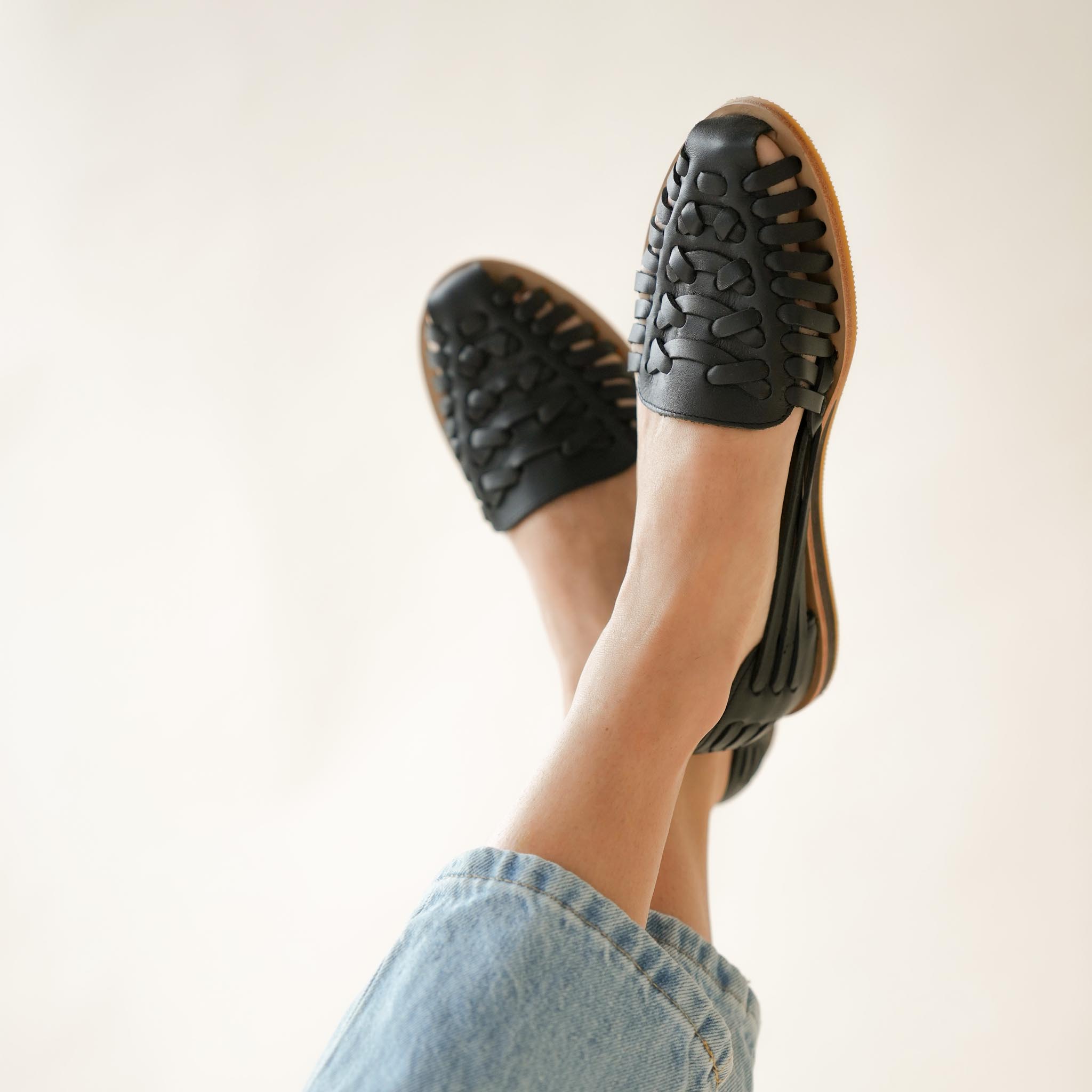 Image 4 Women's Huarache Sandal Black Women's Leather Slip On Nisolo on model