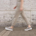 Image 5 Women's Kickaround Sneaker Grey Nisolo on model in motion